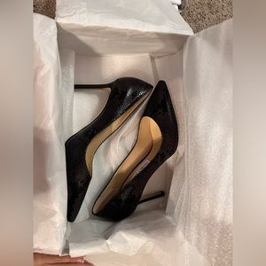 Jimmy Choo heels with a “scale like” pattern